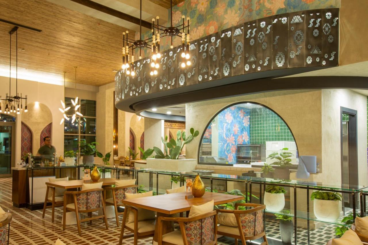 Aparthotel Citadines Abha Exterior foto The interior of the restaurant